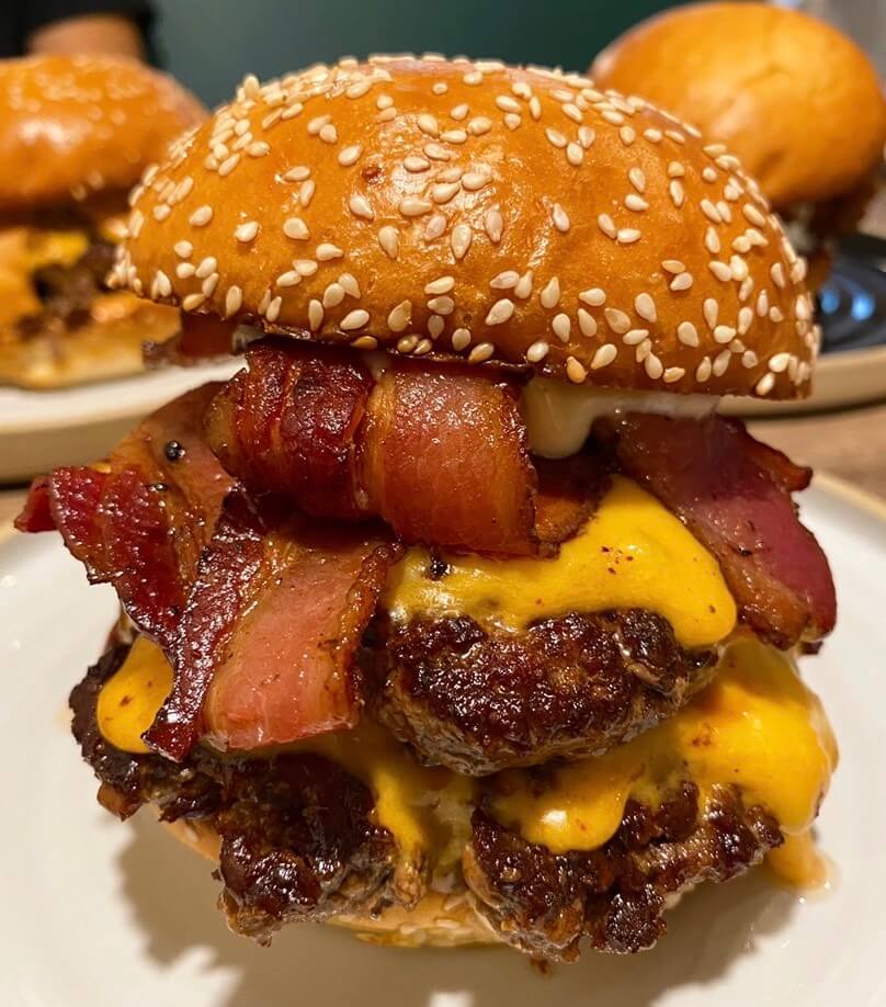 Close up of double trouble burger from crazy good kitchen in Boston's Back Bay, one of the best boston sandwiches