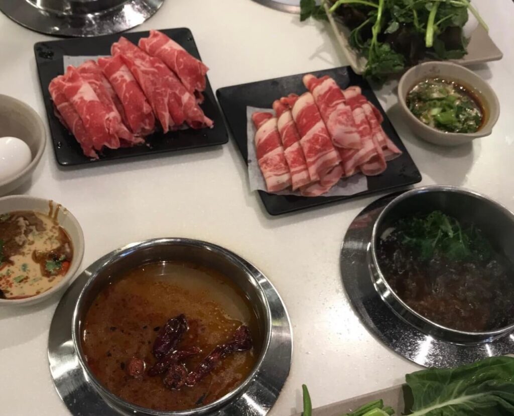 two personal hot pots and meats from spring shabu shabu, a Japanese Restaurant in Boston
