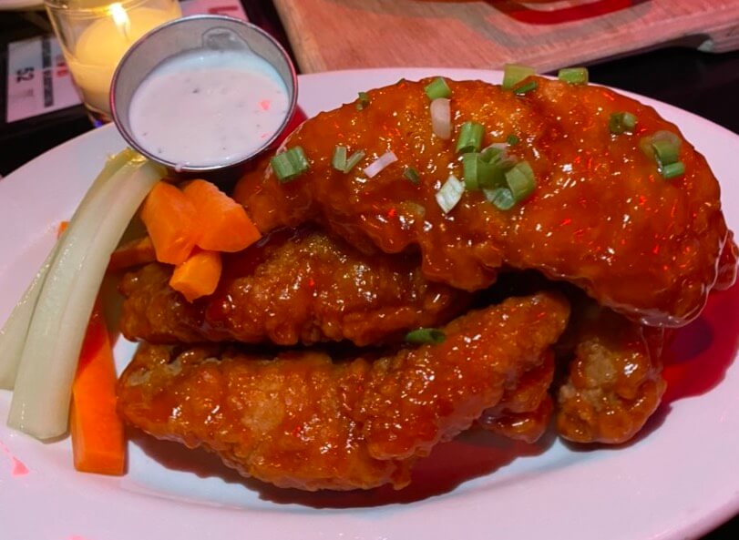 Buffalo chicken tenders from Versus arcade and bar in Boston