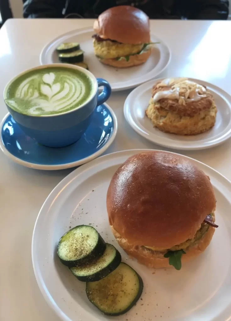 Breakfast sandwich, matcha latte, and lavender biscuit from 3 Little Figs, a Boston best coffee shop