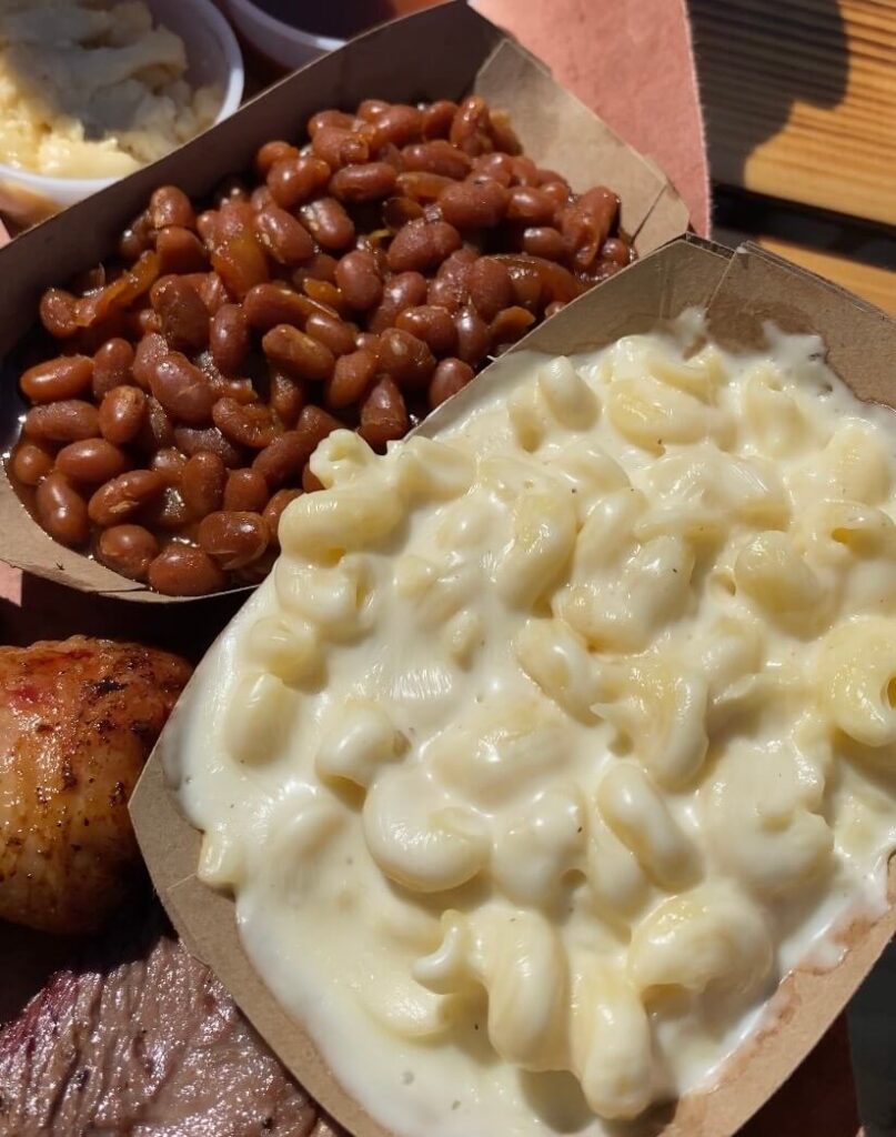 Mac and cheese and beans are Big Pig bbq, a Boston southern food place